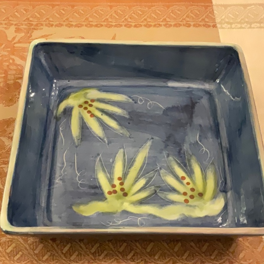 As new,mint condition,10 x10 casserole dish.  Fabulous design,colors and weight.